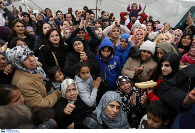 Syrian refugees on Syntagma Square applying for political asylum