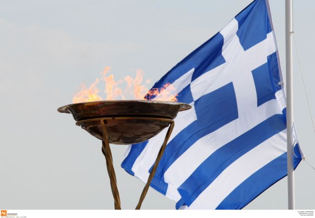 Παραδίδοντας την Ολυμπιακή Φλόγα | tovima.gr