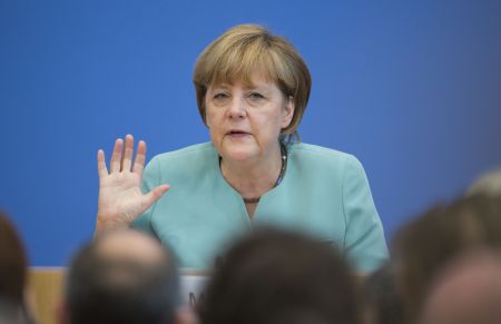 Μέρκελ και Τσίπρας: Ξένοι στην ίδια πόλη