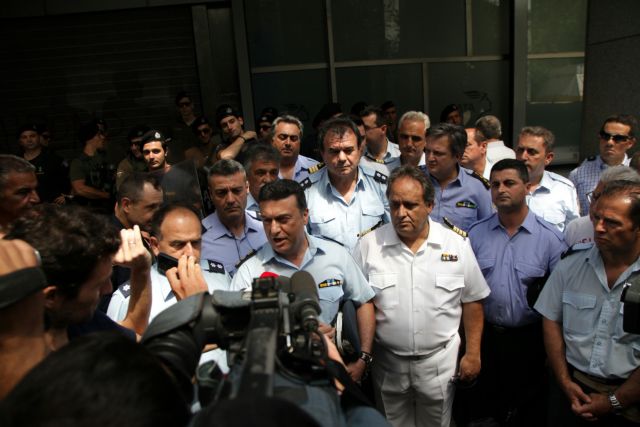 Coast Guard officers demonstrating outside Ministry of Shipping