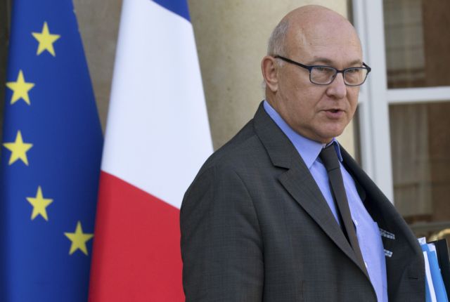 Εξαλλη με την αναβολή μείωσης του ελλείμματος της Γαλλίας η Μέρκελ | tovima.gr