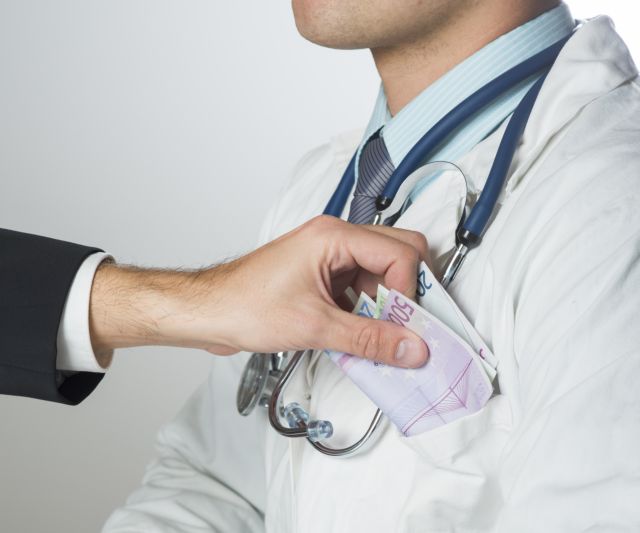 Police arrest two hospital doctors on bribery charges