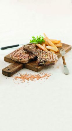 Χοιρινές μπριζόλες μαριναρισμένες σε βότανα