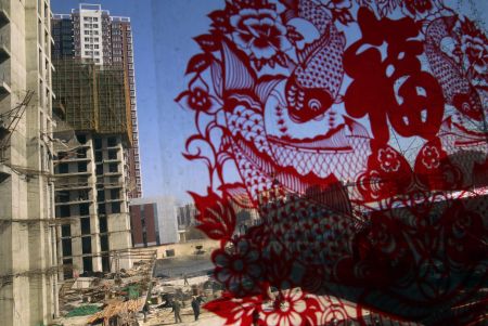 Κίνα: Αναθεωρεί καθοδικά πρόβλεψη για την οικονομική της ανάπτυξη