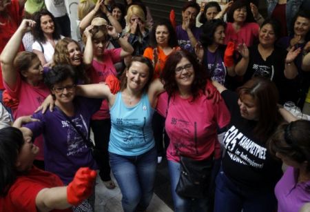 Finance Ministry cleaning staff members celebrate their vindication