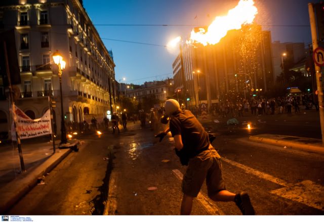 Violent clashes between anti-austerity protesters and riot police