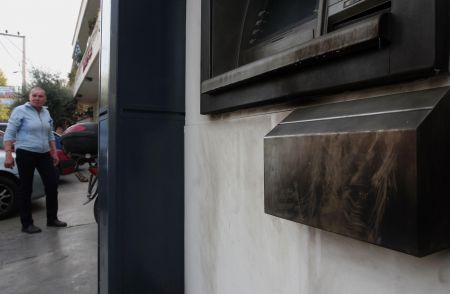 Alpha Bank ATM and store entrance damaged in bomb attack