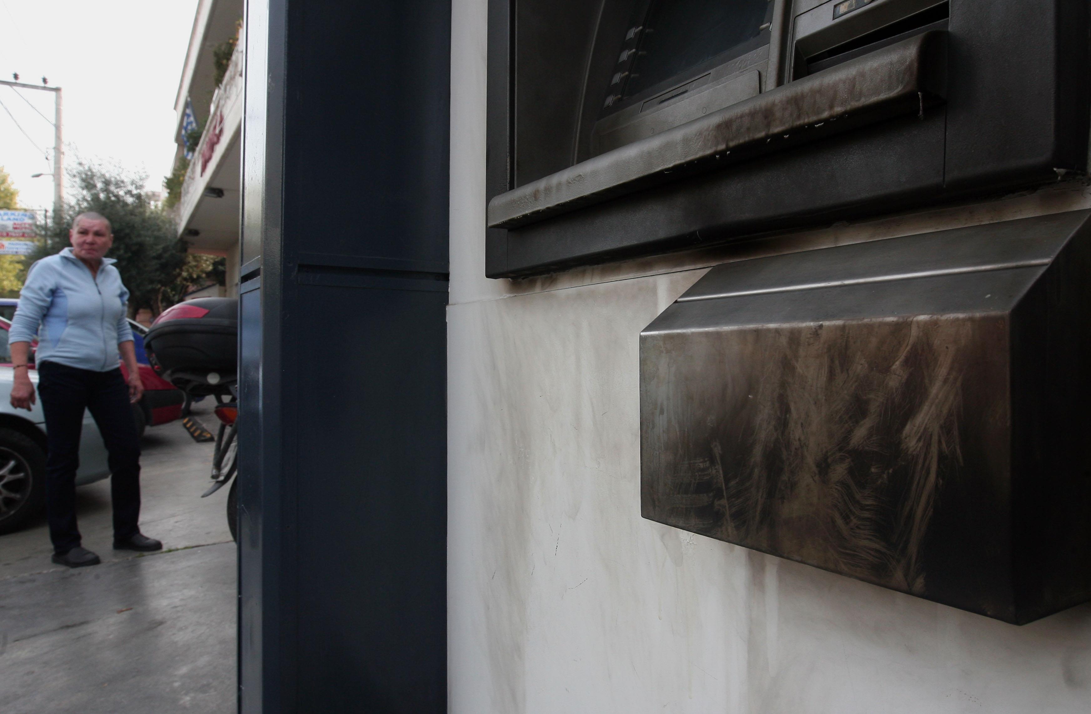Alpha Bank ATM and store entrance damaged in bomb attack
