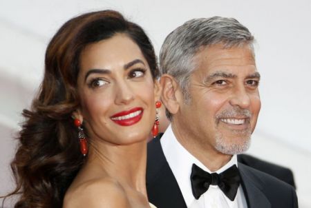 Ο Κλούνι θα μηνύσει γαλλικό περιοδικό που δημοσίευσε φωτογραφίες των διδύμων