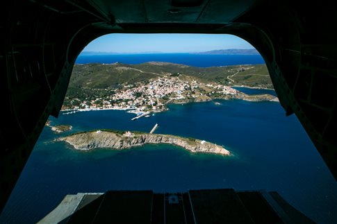 Turkish helicopter flies above Inousses island cluster