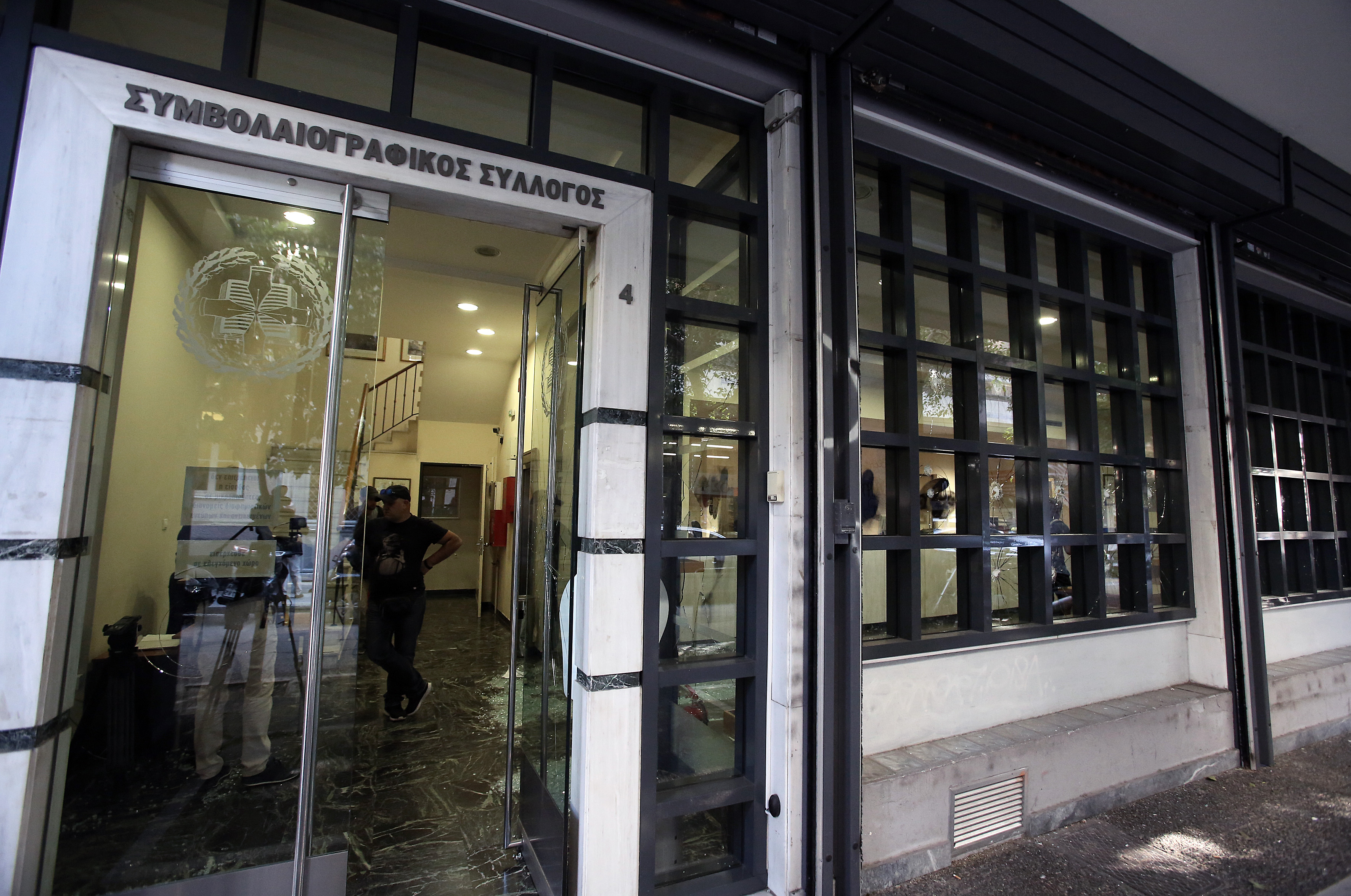 Athens notary’s office smashed by Rouvikonas anarchist group over home auctions