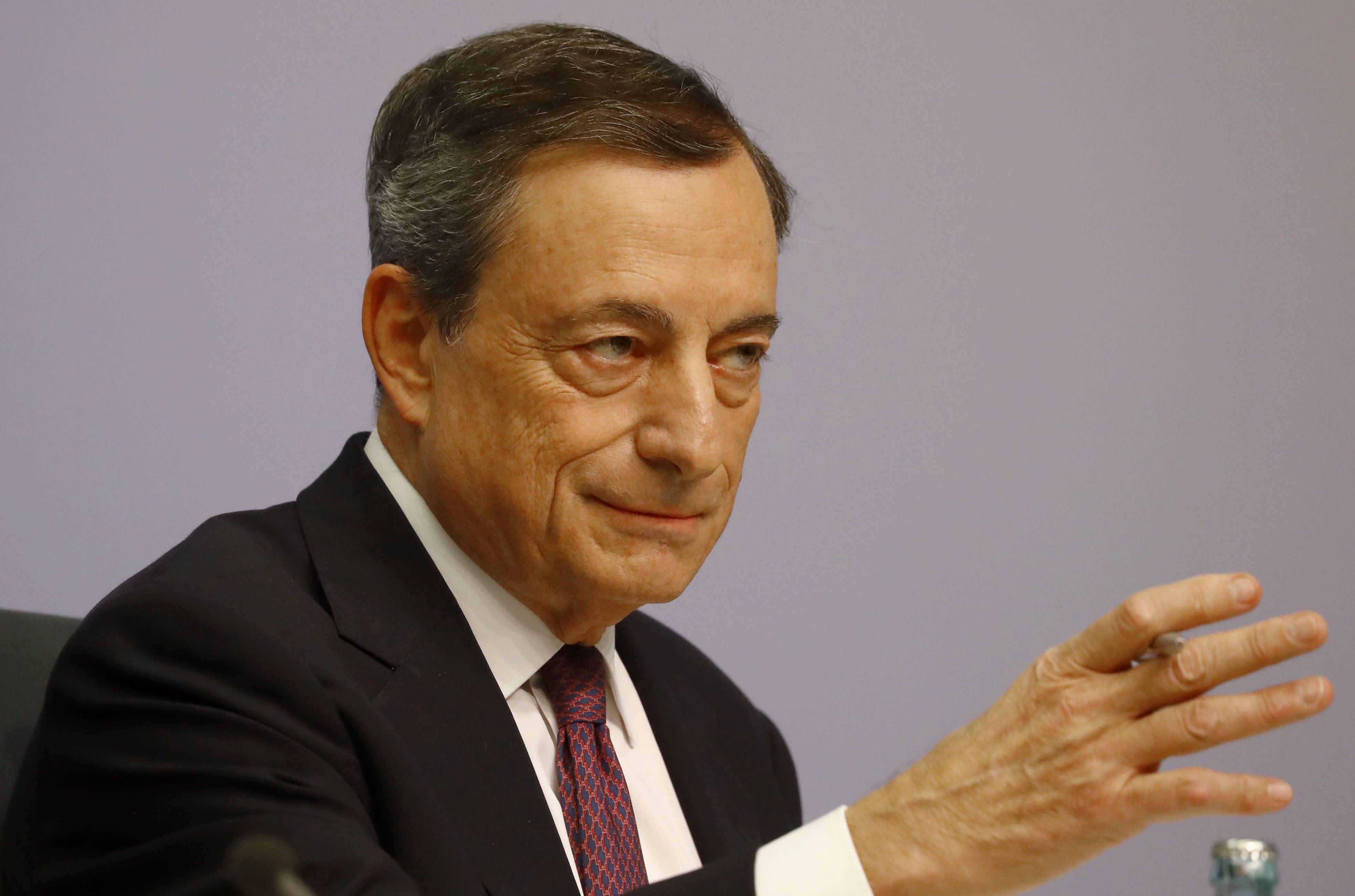 Draghi calls for joint effort on non-performing loans
