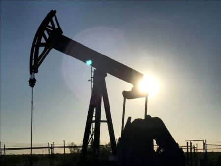 FILE PHOTO: An oil pump operates in the Permian Basin near Midland, Texas
