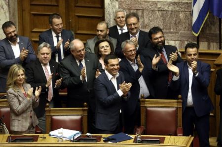 Government wins confidence vote, uproar over level of political discourse