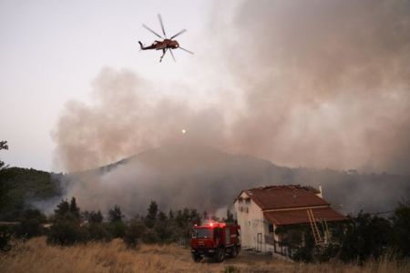 Wildfire continues to rage in Evia, smoke reaches Athens