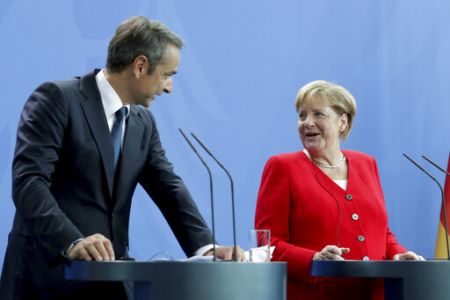 Merkel tells Mitsotakis that Greece’s fiscal commitments are now easier