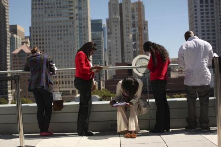 U.S. weekly jobless claims drop below one million; labor market still weak