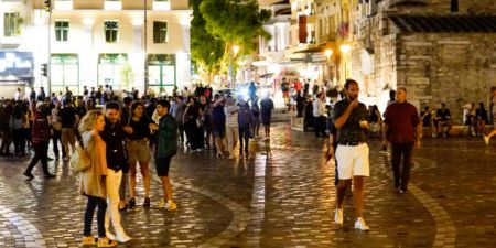 While Greeks largely comply with health measures, parties skirmish over COVID-19 management